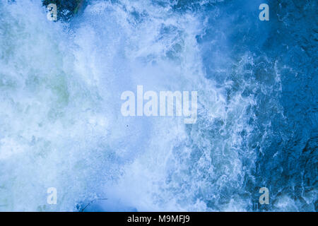 Rushing blue water crashing upon itself on the island of Maui, Hawaii. Stock Photo
