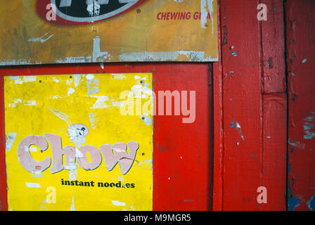 Chow Instant Noodle advert on red door, Suva, Fiji. Stock Photo