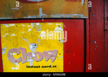 Chow Instant Noodle advert on red door, Suva, Fiji. Stock Photo