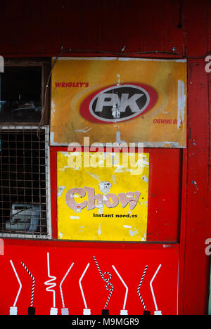 Chow Instant Noodle advert on red door, Suva, Fiji. Stock Photo