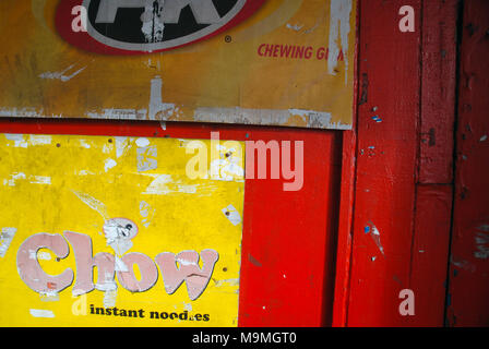 Chow Instant Noodle advert on red door, Suva, Fiji. Stock Photo