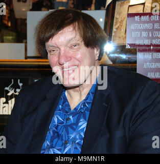 LAS VEGAS - NOVEMBER 30: Richard ' Jawz'  Kiel (The Spy Who Loved Me, Moonraker) and Maud Adams (The Man with The Golden Gun, Octopussy)  at the Gallery of Legends memorabilia store in the mall adjoining the Planet Hollywood Hotel & Casino.  on November 29, 2008 in Las Vegas, Nevada.    People:  Richard Kiel, Maud Adams Stock Photo