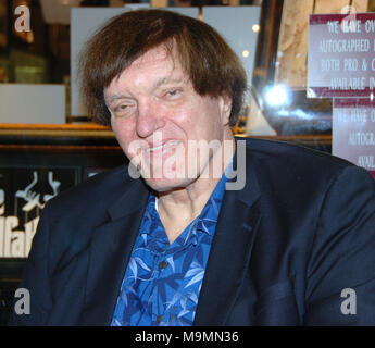 LAS VEGAS - NOVEMBER 30: Richard ' Jawz'  Kiel (The Spy Who Loved Me, Moonraker) and Maud Adams (The Man with The Golden Gun, Octopussy)  at the Gallery of Legends memorabilia store in the mall adjoining the Planet Hollywood Hotel & Casino.  on November 29, 2008 in Las Vegas, Nevada.    People:  Richard Kiel Stock Photo