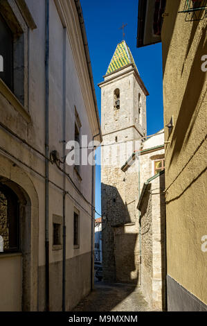 Narrow alleyway with bell tower of the church of San Nicola, Campanile, Chiesa di San Nicola, old town, Agnone, Molise, Italy Stock Photo