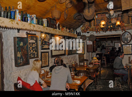 Customers at the Johnny Fox pub. It is the oldest (1798) and the highest pub in Ireland and is situated in Glencullen, a village a few miles south of Stock Photo