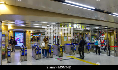 Osaka, Japan - Nov 25, 2016. Entrance gates at railway station in Osaka, Japan. Rail transport in Japan is a major means of passenger transport. Stock Photo