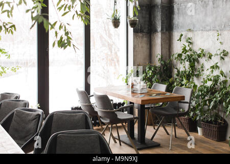 Interior of a stylish cafe in brown-gray tones Stock Photo