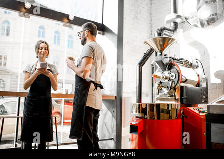 Baristas talking in the coffee shop Stock Photo