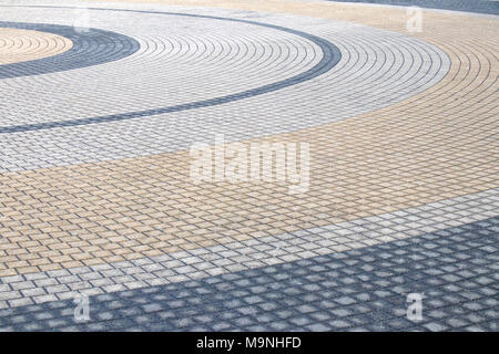 Area of concentric cobblestone circils in city centre Stock Photo