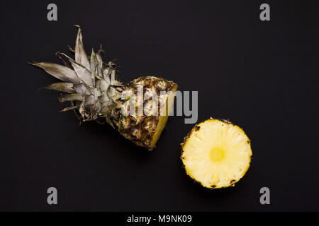 Pineapple. Shot sliced in half to show inner fruit Stock Photo