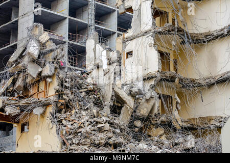 Building demolition is being done in traditional way Stock Photo