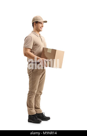 Full length profile shot of a delivery person holding a package and waiting in line isolated on white background Stock Photo