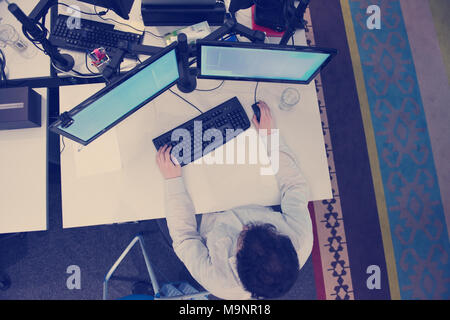 top view of software developer writing programming code on computer Stock Photo