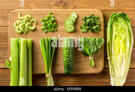 Vegetables for vitamin salad on a cutting board. Concept. Top view. Stock Photo