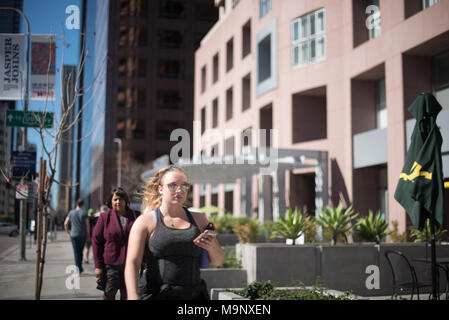 LOS ANGELES, CA - March 15, 2018: Unidentified ordinary people in the streets of Downtown of Los Angeles on March 15, 2018. Stock Photo