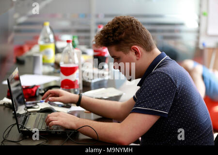 Belarus Minsk 06 August 2016 The Park of High Technologies. Competitions programmers.A young man is working at the computer.Work of the programmer. Stock Photo