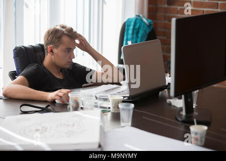 Belarus Minsk 06 August 2016 The Park of High Technologies. Competitions programmers.A young man is working at the computer.Work of the programmer. Stock Photo
