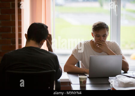 Belarus Minsk 06 August 2016 The Park of High Technologies. Competitions programmers.Men work for laptops. Programmers work Stock Photo