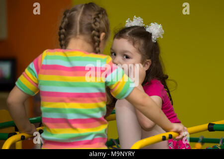 Belarus, Gomel, November 9, 2017. Gomel Children's Center. The girl tells a secret. Children's secrets Stock Photo