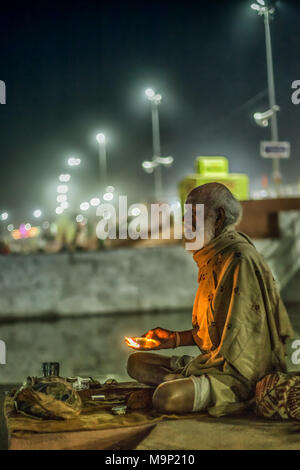 Pilgrim with oil lamp during Hindu festival Kumbh Mela, Ujjain, India Stock Photo