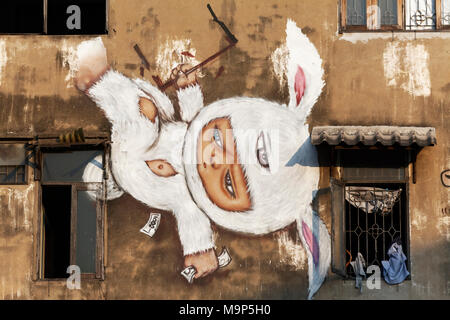 Child in bunny costume, Mural by Thai graffiti artist Alex Face, Graffiti Park Si Surut Alley, Ratchathewi, Bangkok, Thailand Stock Photo