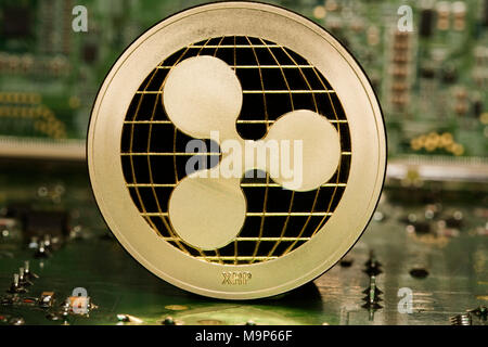 Golden coin ripple, XRP, symbol image crypto currency, digital currency Stock Photo