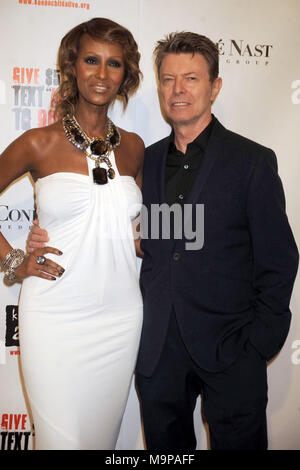 NEW YORK CITY, NY - NOVEMBER 13:  David Bowie and Iman inside Keep A Child Alive's 5th annual Black Ball at Hammerstein Ballroom on November 13, 2008 in New York City.   People:  David Bowie,  Iman Stock Photo