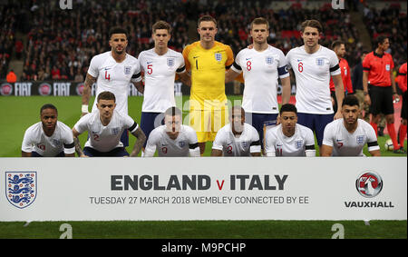 Back row, left to right, England's Kyle Walker, John Stones, Jack Butland, Eric Dier and James Tarkowski. Front row, left to right, England's Raheem Sterling, Kieran Trippier, Jamie Vardy, Ahsley Young, Jesse Lingard and Alex Oxlade-Chamberlain line up before the international friendly match at Wembley Stadium, London. Stock Photo