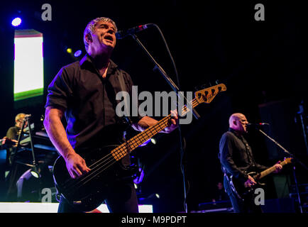 The stranglers performing live, JJ Burnel in foreground, G Live, Guildford, UK, 26 March 2018. Stock Photo