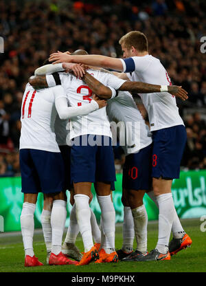 London, UK. 27th Mar, 2018. Players of England celebrate Jamie Vardy's score during a friendly soccer match between England and Italy at the Wembley Stadium in London, Britain on March 27, 2018. England and Italy drew 1-1. Credit: Han Yan/Xinhua/Alamy Live News Stock Photo