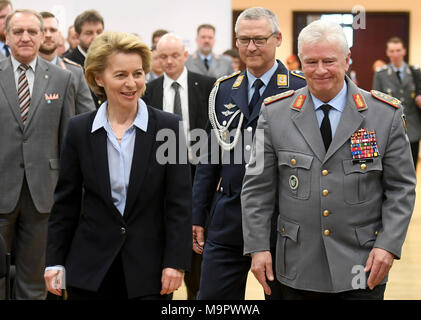 Hannover, Germany. 28 March 2018, Germany, Hannover: Minister of Defence from the Christian Democratic Union (CDU), Ursula von der Leyen, walking with Inspector General of the German armed forces, Volker Wieker (R) during a ceremony in the newly-named Sergeant Major Lagenstein Barracks. Photo: Holger Hollemann/dpa Stock Photo