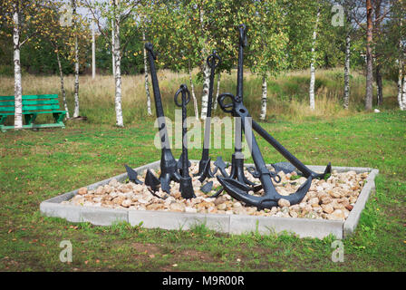 Composition from anchors, like decoration in  park in town Vytegra Stock Photo