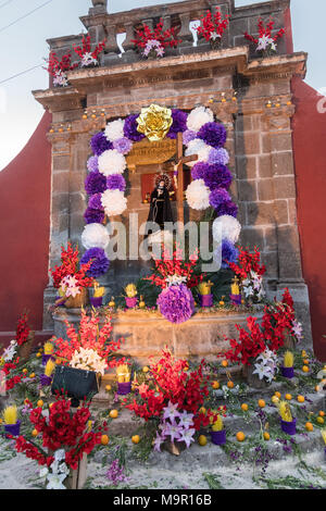 A community altar celebrating El Viernes de Dolores during Holy Week at the Aldama fountain March 23, 2018 in San Miguel de Allende, Mexico. The event honors the sorrow of the Virgin Mary for the death of her son and is an annual tradition in central Mexico. Stock Photo