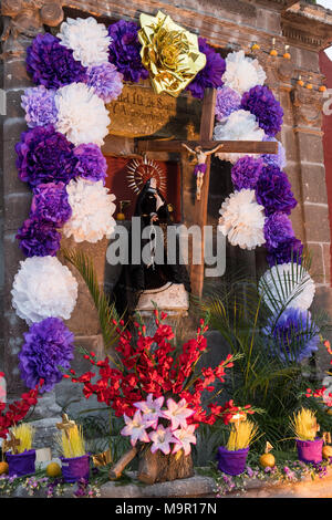 A community altar celebrating El Viernes de Dolores during Holy Week at the Aldama fountain March 23, 2018 in San Miguel de Allende, Mexico. The event honors the sorrow of the Virgin Mary for the death of her son and is an annual tradition in central Mexico. Stock Photo