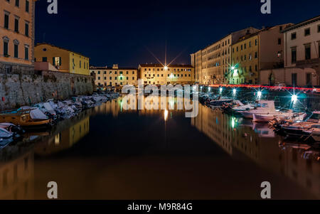 Marina in the historic center of Livorno at night, Tuscany, Italy Stock Photo