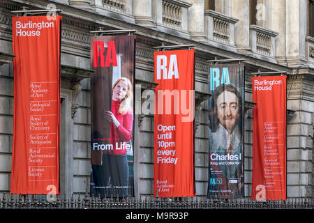 LONDON, UK - MARCH 08, 2018:  Colourful banners for Royal Academy of Arts outside Burlington House Stock Photo