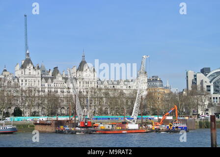 Large crane on a barge near Whitehall Gardens, Victoria Embankment, London, England, UK Stock Photo