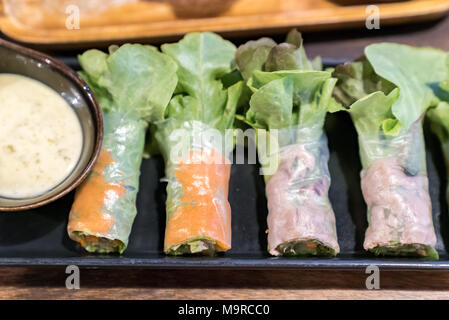 Salad rolls with dipping sauce Stock Photo