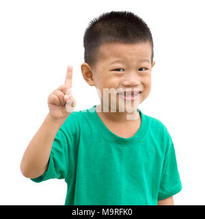 Asian child giving thumb up. Portrait of young boy isolated on white background. Stock Photo