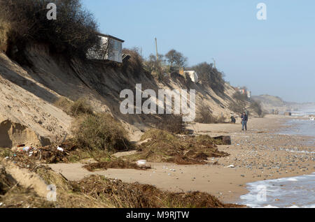 March 2018, Clifftop property collapsing due to coastal erosion after recent storm force winds, Hemsby, Norfolk, England, UK Stock Photo