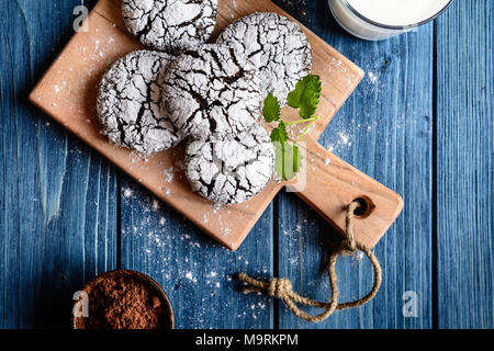 Chocolate crinkle cookies with powdered sugar icing Stock Photo