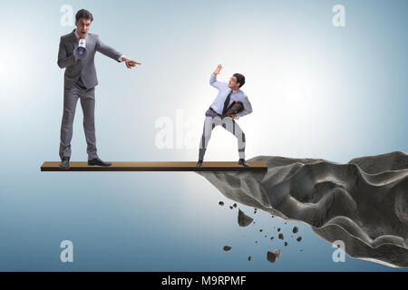 Angry unwise boss shouting and yelling at this important employee Stock Photo