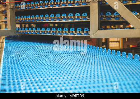 Empty conveyor belt for bread factory. Stock Photo