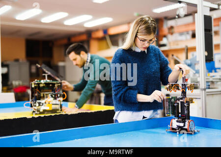 Young student of robotics working on project Stock Photo