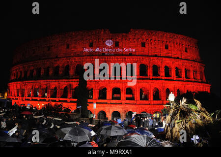 A view of the Colosseum lit up in red to draw attention to the persecution of Christians around the world, during the ceremony promoted by 'Aid to the Church in Need' in Rome.  Where: Rome, Lazio, Italy When: 24 Feb 2018 Credit: IPA/WENN.com  **Only available for publication in UK, USA, Germany, Austria** Stock Photo