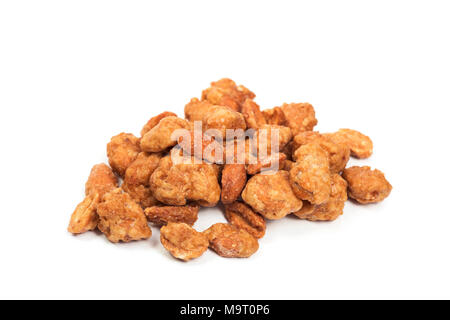 closeup of some cacahuetes garrapinados, spanish candied peanuts, on a white background Stock Photo