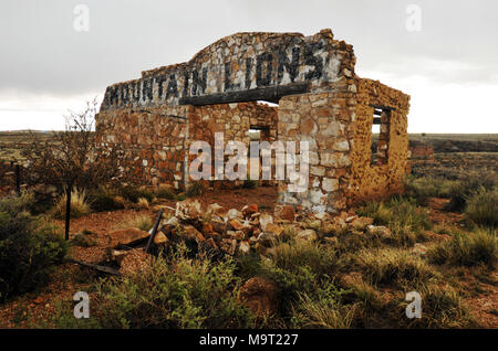 The crumbling stone mountain lion building stands at the abandoned roadside zoo in Two Guns, Arizona, once a popular tourist attraction on Route 66. Stock Photo