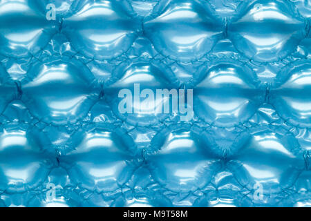 Big blue plastic bubble wrap background surface Stock Photo