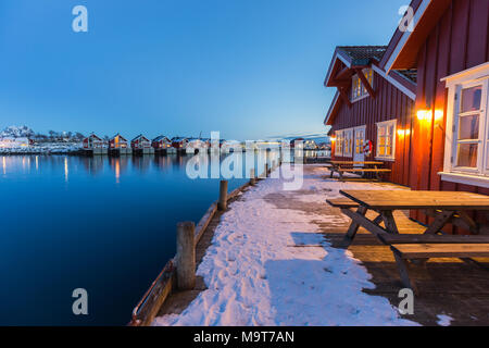 Traditional fishermans cabins or rorbuer at the waterside in Svolvaer, Lofoten, Norway Stock Photo