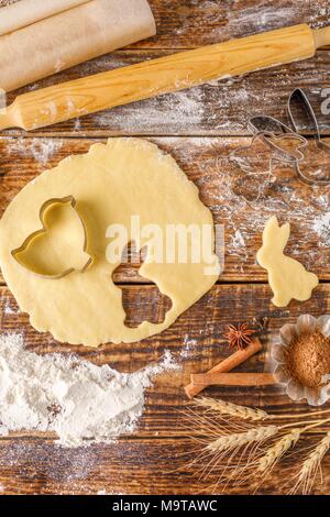 Easter cookies on a wooden background. Beautiful still life with cookie making. Stock Photo